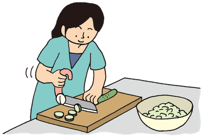 自助具を使っているところ